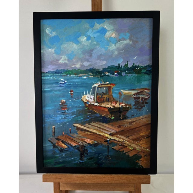 The Oil painting on Cardboard titled “Old wooden pier leading into the sea” captures the quiet poetry of a coastal scene...