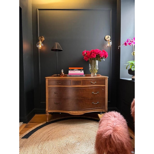 French Provincial Walnut Dresser/Entryway Chest, perfect for adding a touch of timeless elegance to any living space. This...