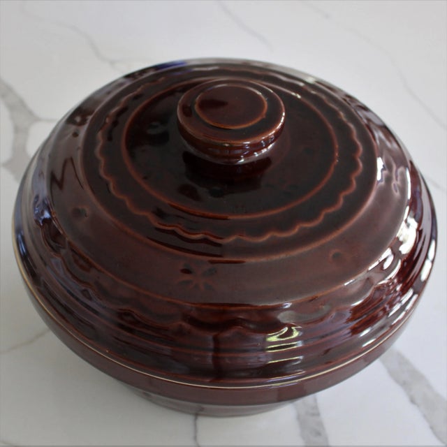 Antique "Marcrest" covered oven proof Casserole in a rich dark brown. We love this rustic covered casserole made and...