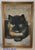 Vintage framed oil painting of a tortoise shell cat. This painting show the cat being aware of its surroundings with a...