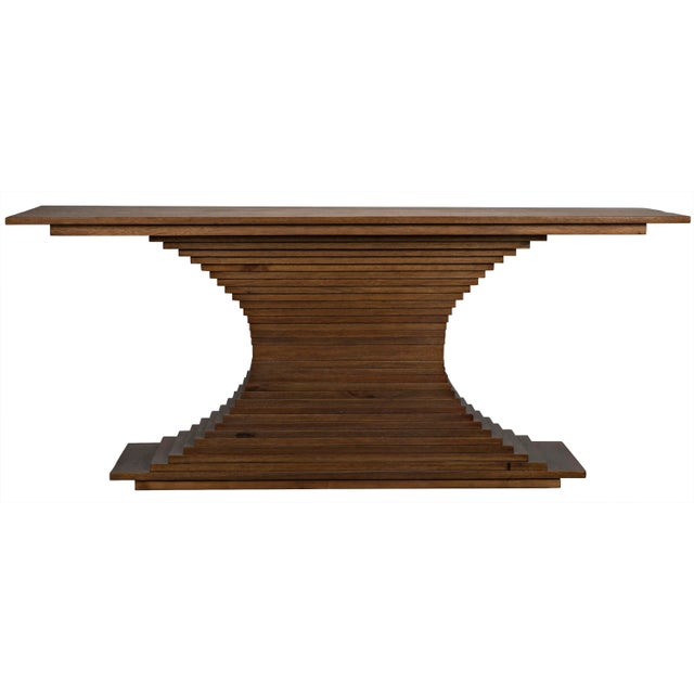 Walnut is expertly hand-carved into decorative ridges, creating curves out of straight lines, and turning extensive...