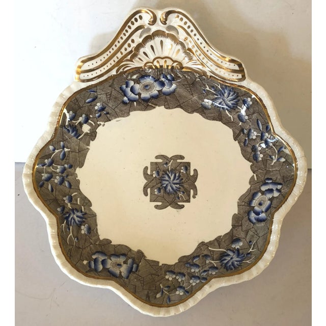 This beautiful pair of early 19th Century Spode is in the deep shell shape with ruffled edges and a hanging handle. The...
