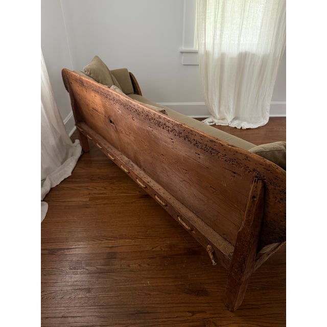 This handsome 1800s New England country settee captures the simple elegance and sturdy character of early American rural...