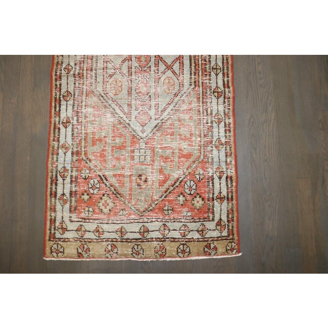 a worn early 20th-century Persian Serab Runner