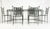 An elegant and increasingly rare seven-piece wrought iron patio dining set designed by Mario Papperzini for Salterini,...