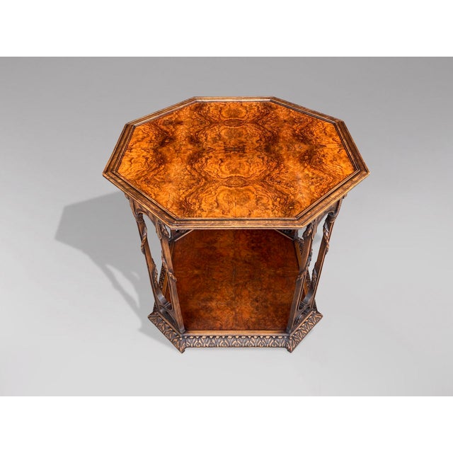 A fine 20th century large octagonal burr walnut two tier end table. The dished moulded burr walnut veneer tray top with...