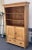 Antique pine bookcases are hard to find so the shell of this piece was provided by a vintage pine armoire. With one board...