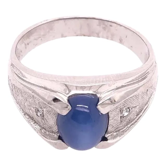 14 Karat White Gold Oval Sapphire Cabochon Ring With Diamond Accents For Sale