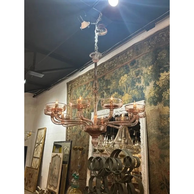 Decorative rose colored Murano glass custom designed with 10 arms. Creates a modern look!