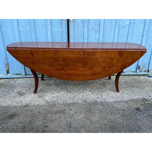 Early 20th Century Federal Style Oval Cherry Drop Leaf Dining Table For Sale - Image 12 of 12