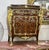 Gorgeous copper dresser with gold leaf details. Stunning Italian commode. Has a beautiful gold leaf details. Elevate your...