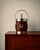 A striking english equestrian ice bucket dating from the 1970s, combining classic vintage barware with a bold and highly...
