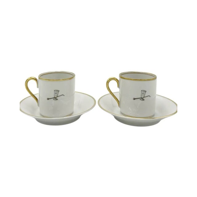 Details: -Vintage pair equestrian jockey porcelain demitasse cup & saucer with gold trim -Cup features a jockey wearing a...