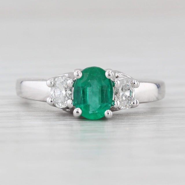 Gemstone Information: - Natural Emerald - Carats - 0.80ct Cut - Oval Color - Green Treatment - Oiling - Natural Diamonds -...