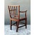 This George III country house "elbow" armchair is a fine representation of 18th-century English joinery, distinguished by...