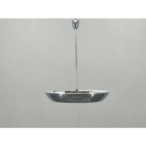 A rare and highly collectible bauhaus chandelier produced by drupol in czechoslovakia during the 1940s. This “ufo” form...