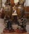Decorate a mantel, console, or buffet with this richly detailed pair of antique figural vases by French sculptor Hippolyte...