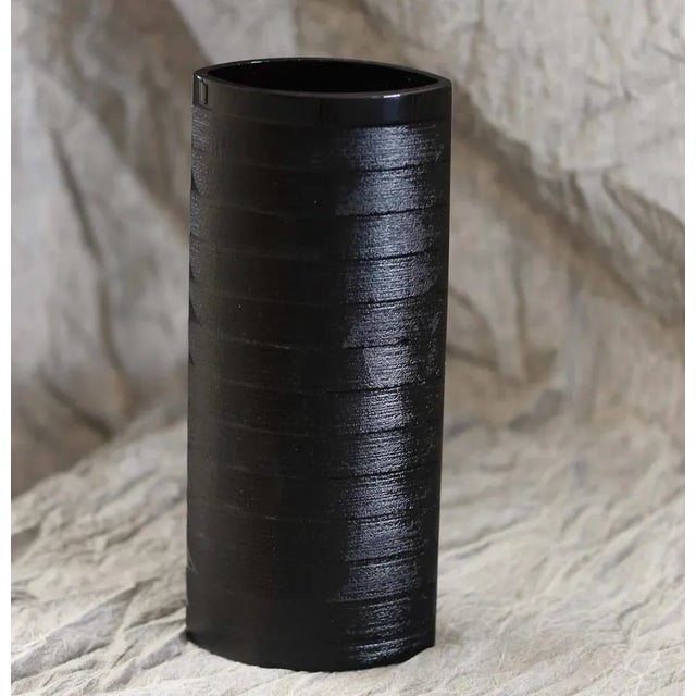 Bohemia crystal in color, hand blown with decorative ribs. Bohemia glass, 1cm. thick. This piece is attributed to the...