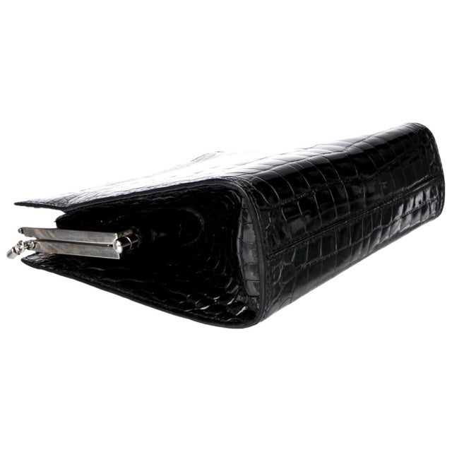 Cartier Panther Clasp Embossed Leather Made from patent cowhide leather and embossed in an alligator skin pattern, this...