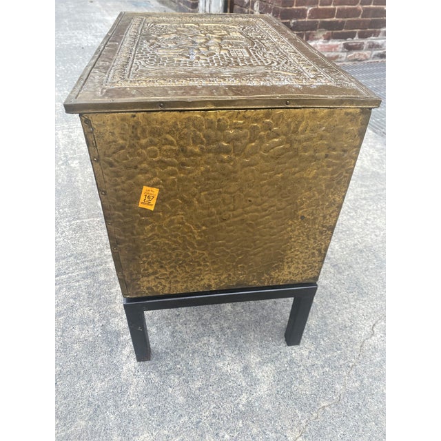 Here is a decorative and functional pressed brass lift lid box with a zinc liner and an added handmade iron base. The top...