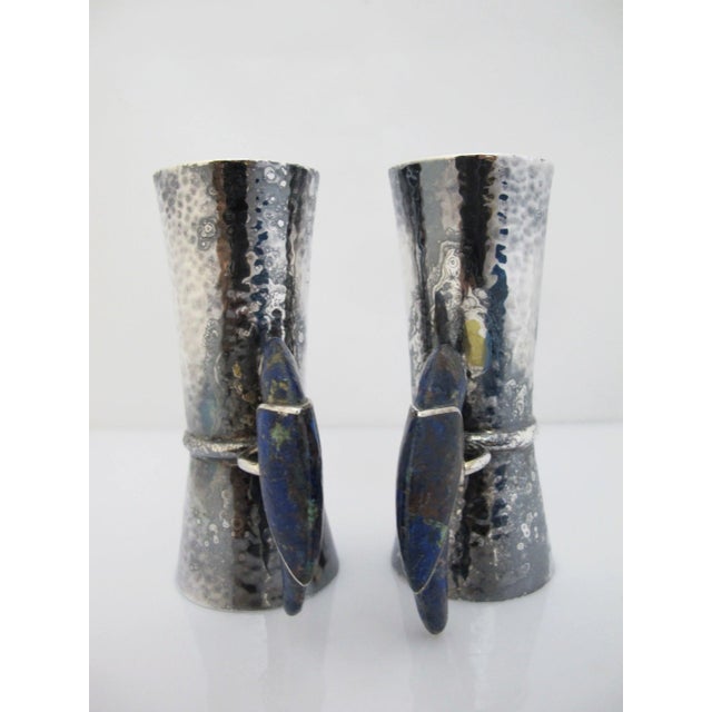 Vintage mid-century Mexican modernist vessels, these are hand-hammered silver-plated barware glasses featuring distinctive...