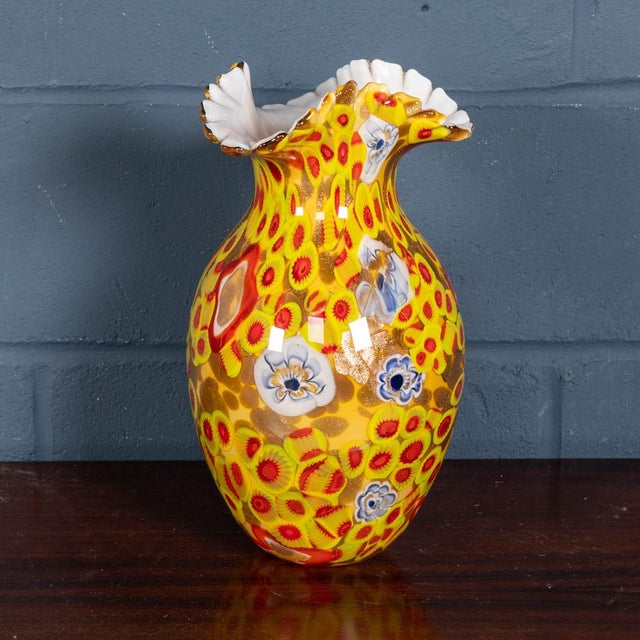 A 20th Century vibrant and highly decorative Murano art glass vase, dating to the late 20th century, of bulbous form with...
