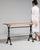 A balanced mid-size bistro table combining practicality and traditional style. The design reflects early 20th century...