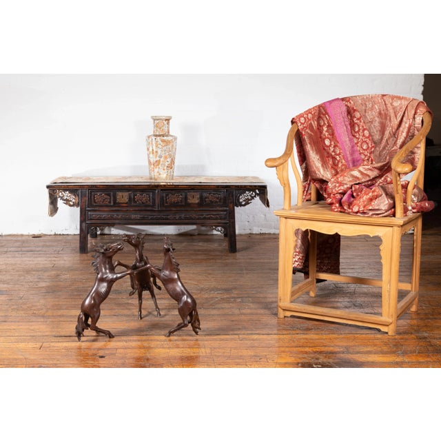 A vintage lost wax cast bronze triple horse table base from the mid 20th century, with bronze patina. Created with the...