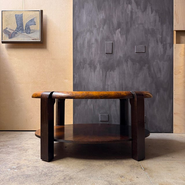 Early 20th Century two tiered Art Deco coffee table in various wood veneer finishes.