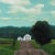 Camp Road captures a tranquil rural scene, featuring a winding path leading to a pair of white houses nestled among lush...