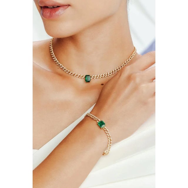 This is part of Chairish’s Fine Jewelry assortment. This Modern Emerald Diamond Chain Bracelet in 18K gold showcases...
