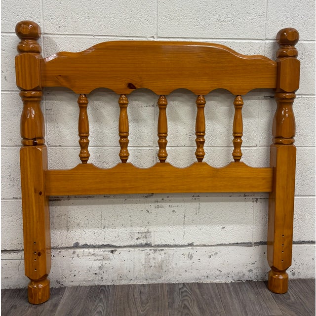 This is an absolutely gorgeous vintage twin-sized cannonball spindle headboard with bed frame. Wood appears to be maple or...