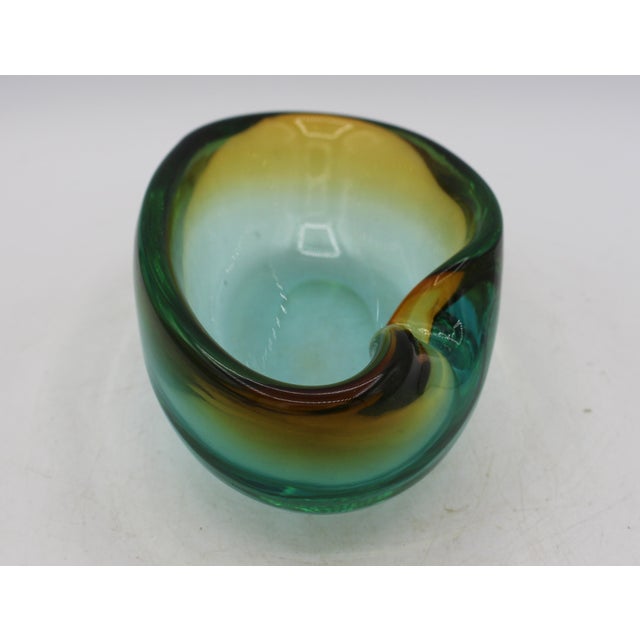 Amber to green Murano glass amorphous form cigar ashtray, circa 1950s. Sommerso technique - multi-hued effect created by...