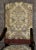 1920s Antique Carved Oak Armchair 1920s Tudor Style High Back Fringe Stretcher Base For Sale - Image 5 of 13
