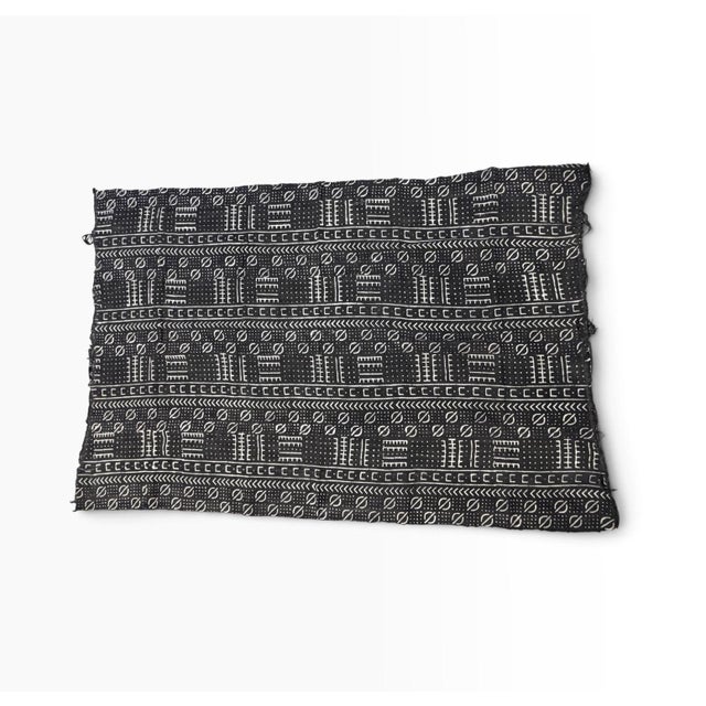 Vintage hand weaving from 100% cotton, this authentic mud-cloth textile is made by the skilled artisans of the Bamana...