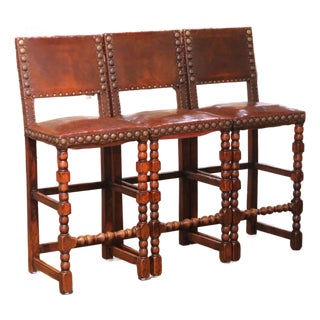 Set of Three 19th Century French Gothic Carved Oak and Leather Bar Stools For Sale