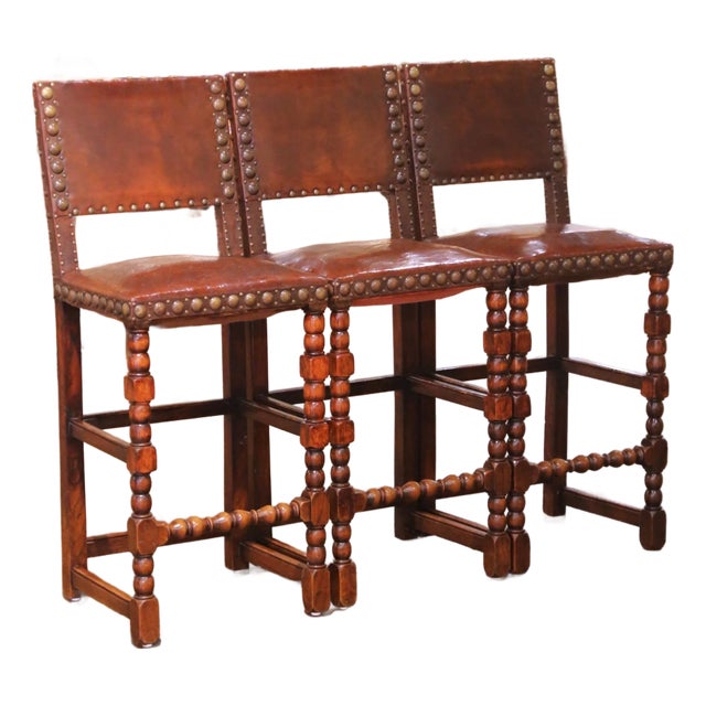 Set of Three 19th Century French Gothic Carved Oak and Leather Bar Stools For Sale