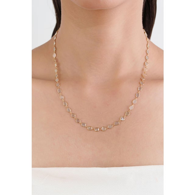 This slices station necklace features 4.27 carats of natural uncut diamond in mixed shapes, set in 18K yellow gold. Each...