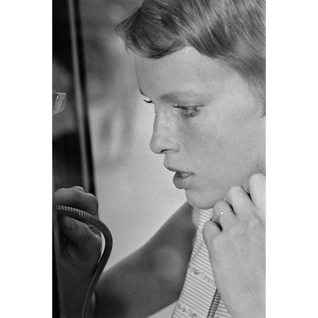 Rosemary's Baby American actress Mia Farrow makes a call from a phone booth as Rosemary Woodhouse, on the set of the Roman...