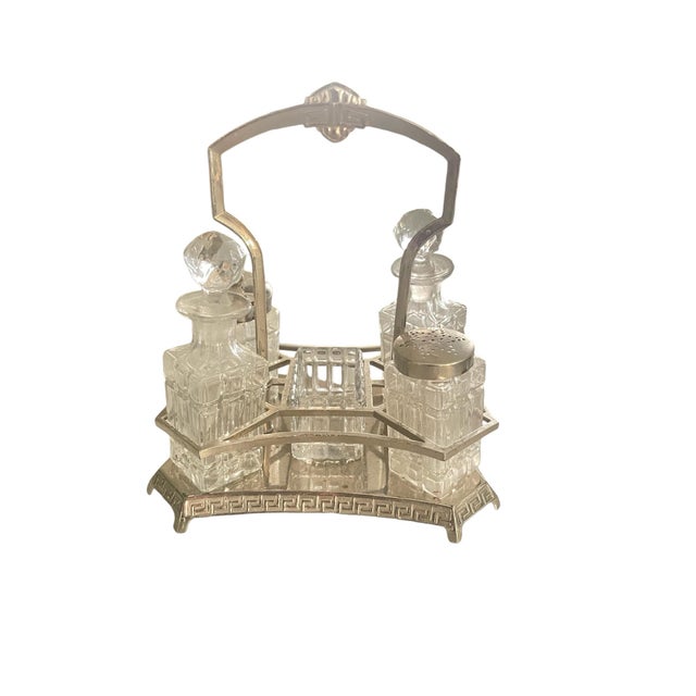 Gorgeous rare silver plated hand cut glass cruet set with 6 pieces included