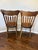 Celebrate the craftsmanship of turn-of-the-century American furniture with this handsome pair of Late Victorian pressed-...