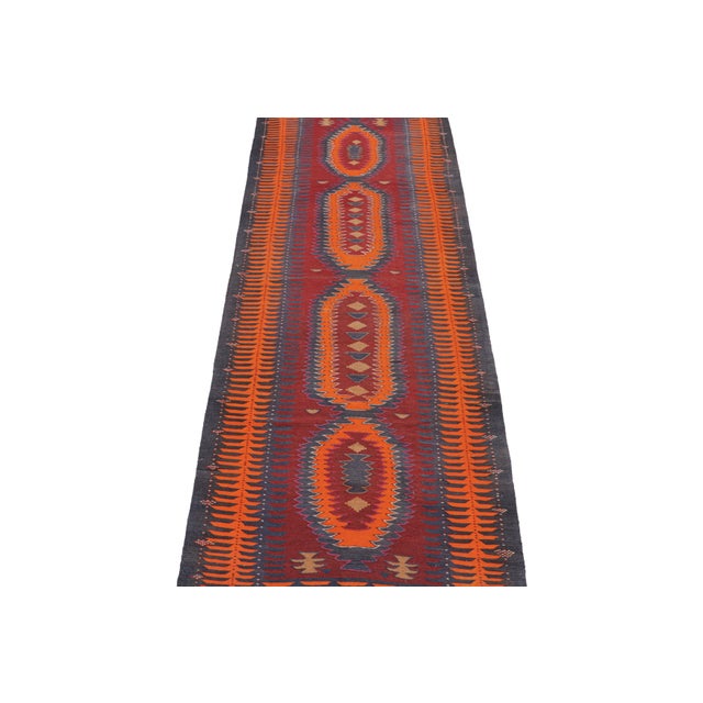 This rare vintage 5x14 Persian Kilim is a tribal Karadagh rug — named after the mountainous region known for its fabulous...