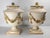 We are selling this decorative pair of Italian covered urns. These capodimonte or Nove style urns have garlands of raised...