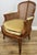 Bring timeless French elegance into your home with this Vintage French armchair , beautifully combining an elegant cane...