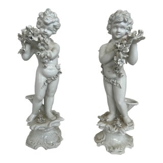 Mid-Century Italian Porcelain Cherub Figures With Floral Garlands Vases a Pair For Sale