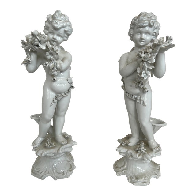 Mid-Century Italian Porcelain Cherub Figures With Floral Garlands Vases a Pair For Sale