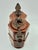 Antique Watcombe pottery teapot by Christopher Dresser featuring brown terracotta finish with floral details. This is a...