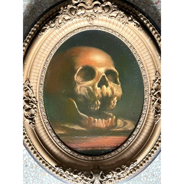 This compelling 20th-century oil painting captures the haunting beauty of a classic memento mori subject. Rendered on...