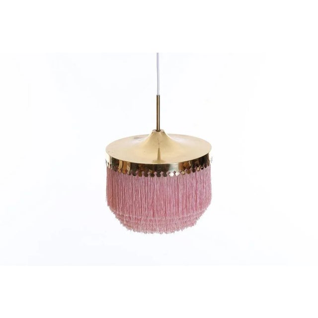 Brass and silk fringes. Produced by Hans-Agne Jakobsson, Markaryd, Sweden, 1960s. Measures: Diameter 28 cm, height is...