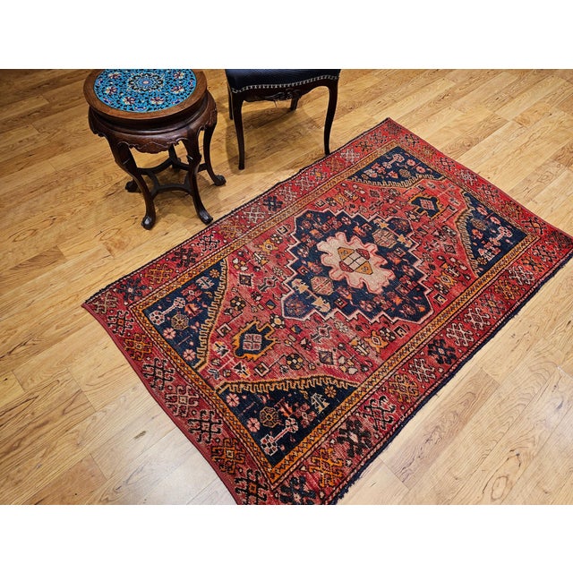 Early 20th Century Vintage Persian Malayer Area Rug, meticulously hand-knotted. From the renowned weaving region of...